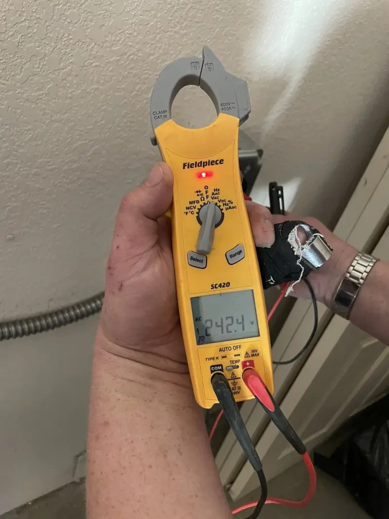 Voltage testing with clamp meter during Hot Tub / Pool Electrical Wiring in Stonegate